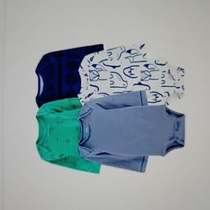 NWT: Carter's set of 4  Animal Printed Bodysuits (onesies)